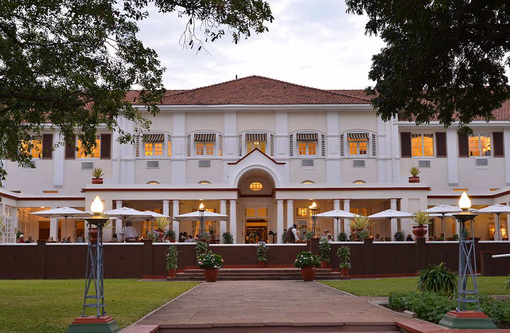 Majestic Victoria Falls hotel exterior at dusk, Zimbabwe