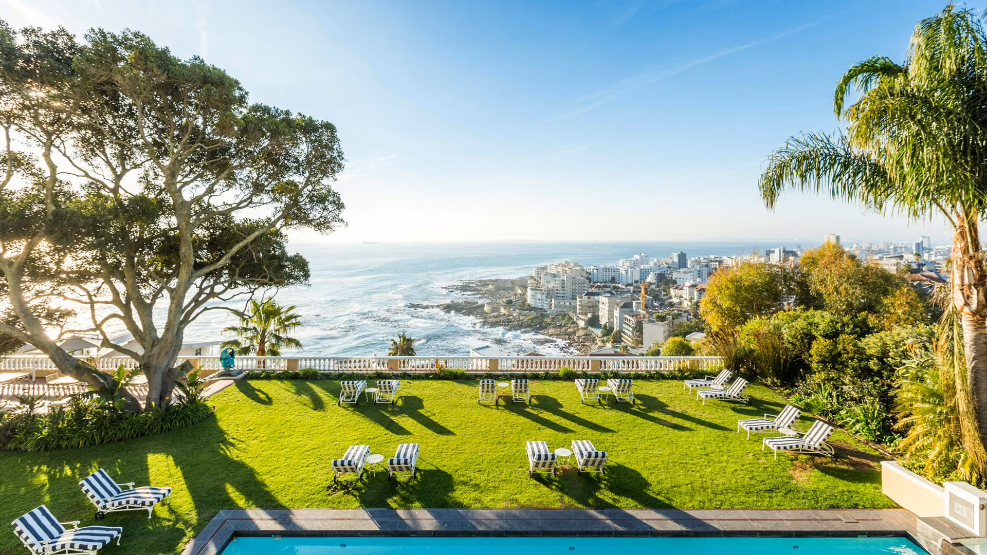 View from Ellerman house over the pool and garden of the sea, luxury boutique hotel in Cape Town, South Africa