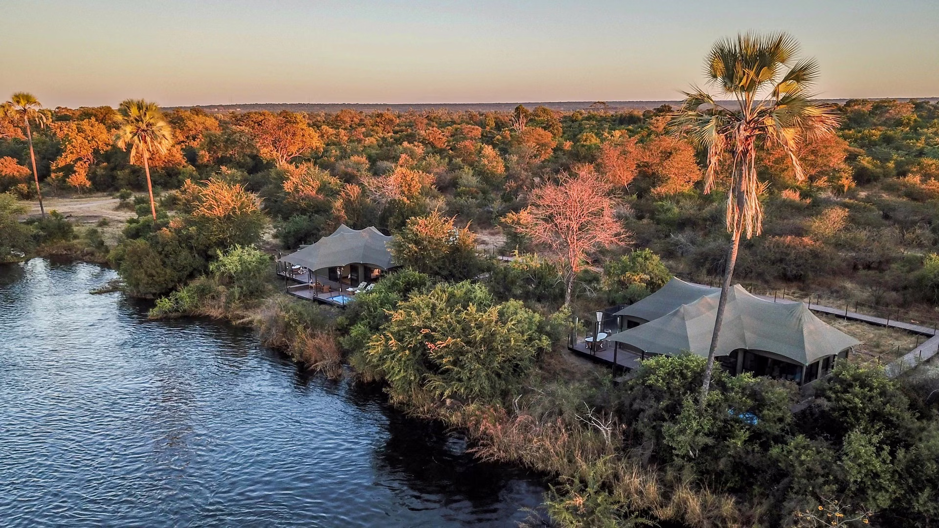 Aerial view of Old Drift Lodge tents along the Zambezi River